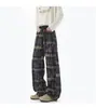 Pantalones de Cuadros Estilo Americano Transfronterizos para Hombre Primavera y Otoño 2026 Frescos y Elegantes Pantalones Largos Casuales de Alta Gama para Hombre Venta al por Mayor de Fábrica