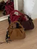 Elegante bolso de mano plisado 2026 nuevo popular retro simple bolsa de albóndiga nicho moderno bandolera hobo bag
