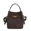 Bolso Cubo de Textura de Alta Gama Retro para Mujer 2025 Invierno Nuevo Elegante Versátil Bolso de Hombro Cruzado Jiangyue