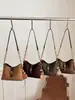 Bolso de mano de diseño nicho estilo coreano transfronterizo para mujer, moderno, simple, color liso, texturizado, elegante, bandolera y de hombro vintage