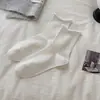 Calcetines de algodón puro para mujer, nuevo estilo de otoño, calcetines de encaje hasta la mitad de la pantorrilla, calcetines dulces JK con borde de burbujas, combinados con zapatos pequeños de cuero, calcetines blancos