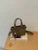 Bolso tipo cubo de tejido de alta gama para mujer, nuevo y elegante, estilo verano chic, de un solo hombro y cruzado