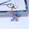 Llavero de Resina con Lentejuelas Letra Inglesa Transfronterizo Europeo y Americano Sentido Avanzado Morado Lindo Colgante para Bolsa Mochila Llavero Adornos