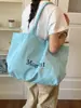 Bolsa de Lona con Estampado de Letras para Viajes Transfronterizos para Mujer 2026 Nueva Moda Gran Capacidad Versátil Ligera Bolso de Hombro