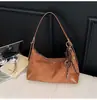 Bolsa Retro de Camurça para Mulheres 2026 Novo Estilo Simples e Versátil Bolsa de Ombro/Axila de Luxo Leve Bolsa Transversal da Moda para o Dia a Dia