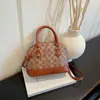 Otoño 2026 Nuevo Bolso de Concha Moda para Mujer Versátil Textura Bolso de Mano Retro Bolso de Hombro Cruzado Bolsos de Mujer al por Mayor