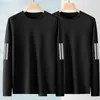 Camiseta casual masculina versátil de cor sólida para o outono 2026, gola redonda solta, manga longa, top moderno