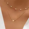 2025 Verano Fresco y Dulce Goteo de Aceite Frijol Negro Capa Única Doble Capa Collar para Mujer Borla Perla Cadena de Clavícula