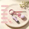 Llavero Cortaúñas de Conejo de Dibujos Animados Colgante de Lazo Rosa Pompon Set Portátil de Cortaúñas y Recogedor de Oídos
