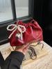 Bolso Cubo Versátil de Alta Gama Estilo Coreano, Nuevo Diseño de Nicho Primavera/Verano 2026 Bolso Bandolera con Cadena para Mujer