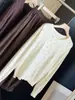 Cardigã de tricô moderno estilo coreano, que rejuvenesce, estampado com estrelas, gola redonda para mulheres, nova coleção de outono, modelagem solta, emagrecedor, manga longa, peça de outer wear