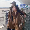 Nuevo Abrigo de Algodón con Plumón para Mujer de Longitud Media por Encima de la Rodilla Estilo Coreano Holgado para Pareja Estudiante Abrigo de Algodón Engrosado Invierno 2025