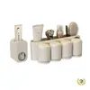 Dispensador de pasta de dientes blanco crema montado en la pared, Juego de vasos para cepillos de dientes colgantes sin perforaciones para baño