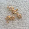 Acessórios de joias de liga retrô para comércio exterior pingente pingente 10MM estrela oca estrela de cinco pontas de Natal