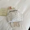 Mochila Pequeña Atmosférica con Lunares y Cierre de Cordón con Lazo, Estilo Simple, Adecuada para Estudiantes Universitarias, Viajes Diarios y Viajes