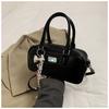 2025 Nuevo Estilo Coreano de Moda Simple Diseño de Nicho Bolso de Bowling para Viajar Dulce Elegante Moderno Bolso Cruzado para Mujer