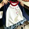 Camiseta de Manga Larga 100% Algodón para Niña 2026 Primavera/Otoño Nuevo Estilo Color Pastel Bloque de Color Capa Base Infantil Top Elegante Versátil Cuello Redondo