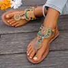 Nuevas sandalias transfronterizas de talla grande para mujer, con suela plana, adornos de cuentas, estilo étnico y diseño europeo y americano, adecuadas para uso en exteriores y en la playa
