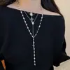 Collar largo de perlas irregulares, estilo de lujo ligero francés, cadena para suéter, joyería de nicho minimalista de alta gama al por mayor para mujer
