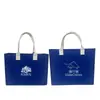 Fabricante de bolsos de fieltro, bolsas de mano, bolsos de mano promocionales de fieltro para exposiciones de automóviles, bolsos de fieltro con bloques de color, hechos a medida según los diseños proporcionados