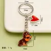 Llavero colgante de perro con goteo de aceite de aleación DIY nuevo, accesorio de llavero de diseño creativo, venta directa del fabricante