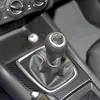 Adecuado para Mazda 3 Angkesaila modificación interior fibra de carbono real panel de palanca de cambios manual de control central pegatinas decorativas