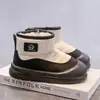Botas de Nieve para Niñas Invierno Engrosadas Superficie de Cuero para Niños Impermeables Botas Cortas Nuevo Estilo 2026 Protección contra el Frío Calidez Zapatos de Pan para Niños