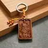 Pingente de chaveiro criativo em estilo étnico chinês de madeira de pêssego, adequado para homens e mulheres, presente de alta qualidade, acessório decorativo, atacado