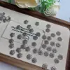 Accesorios de toro de plata de Xizang 50 en un paquete de accesorios de joyería