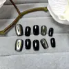 Set de 10 piezas hecho a medida, específico para el tamaño, de calcomanías para uñas hechas a mano con un estilo dulce y genial, vanguardista, con diseños de ojos de diablo, pegatinas para uñas de ojo de gato negro