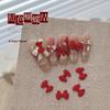 Unhas joias diamante atacado Red New Year liga laço fosco textura tridimensional festiva sorte acessórios de tamanho pequeno