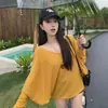 Camiseta de manga larga con cuello en V, hombros descubiertos, manga murciélago, estilo puramente deseable y relajado para mujer, estilo "hot girl" de verano 2026, ligeramente transparente y fresca, top fino para cubrir
