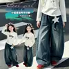 Calça Jeans Feminina Outono 2026 Novo Estilo, Calça Larga Soltinha Grande para Crianças com Acessórios de Estrela, Calça Longa Versátil para Crianças