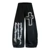 Calça de moletom larga e curva com estampa de cruz e letras estilo high street americano despojado para mulheres, calça casual solta e moderna para dança de jazz