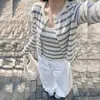 Outono de 2026 novo conjunto de malha estilo coreano feminino moda top de base justo atacado