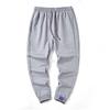 Calças Esportivas Casuais Masculinas de Primavera e Outono Moda Solta Moda Jovem Calças Casuais Comprimento no Tornozelo Calças de Moletom Masculinas