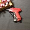 Pistola de cola agulha em estoque atacado etiqueta de roupas pistola de cola agulha meias brinquedo marca registrada fio pendurado fabricantes fornecimento