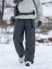 Pantalones de trabajo acolchados a prueba de frío de la marca de moda Izexx, con logo personalizado, para hombres y mujeres, pantalones térmicos de invierno para exteriores