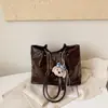 Bolso casual de moda de gran capacidad con textura simple, nuevo bolso de hombro, bolso tote personalizado para mujer otoño 2026
