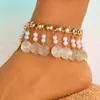 Europa y Estados Unidos pulsera de tobillo con borlas estilo playa oceánica de joyería transfronteriza pulsera de tobillo con gotas de agua perla pluma concha adornos para el pie femenino niña