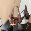 Exquisita textura bolso de hombro único para mujer nuevo estilo lunares de terciopelo moda retro axila otoño gamuza coreano bandolera bolso de mano 2026