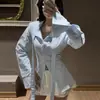 Ropa de mujer transfronteriza europea y americana 2026 otoño nueva moda ajustada elegante camisa a rayas de manga larga con diseño de cuello