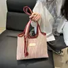 Bolsa Tote para Mujer Verano 2025 Nicho Rayada Simple Moda Casual Minimalista Bolso de Mano de Nicho Bolso de Hombro