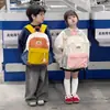Mochila Infantil Nueva Bloque de Color Bolsa Escolar para Jardín de Infancia Niños y Niñas de Primaria Mochila Ligera Casual de Viaje Moderna