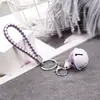 Nuevo llavero de campana de cuerda trenzada, llavero de metal de cuero PU, colgante de coche de dibujos animados, pequeño regalo al por mayor