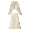Atacado transfronteiriço 2026 Moda europeia casual solta renda amarração gola alta camisa + conjunto de saia curta feminino M6124