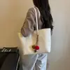 Bolso tejido de patrón vintage para mujer, nuevo modelo 2026, bolsa de mano de gran capacidad para el trabajo y uso casual, bolso de hombro de alta gama, bolso de axila