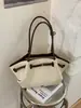 Bolso de Hombro Retro de Gran Capacidad para Mujer Verano 2025 Nuevo Estilo Nicho Alta Apariencia Bolso de Mano para el Trabajo y el Viaje