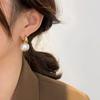 Aretes de botón de perla retro Hepburn francés celebridad de internet nicho chic aretes de botón de alta gama 2024 hot