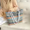 Bolso de Hombro Rayado de Paja de Gran Capacidad 2026 Verano Nuevo Moda Bloqueo de Color Moderno Simple Versátil